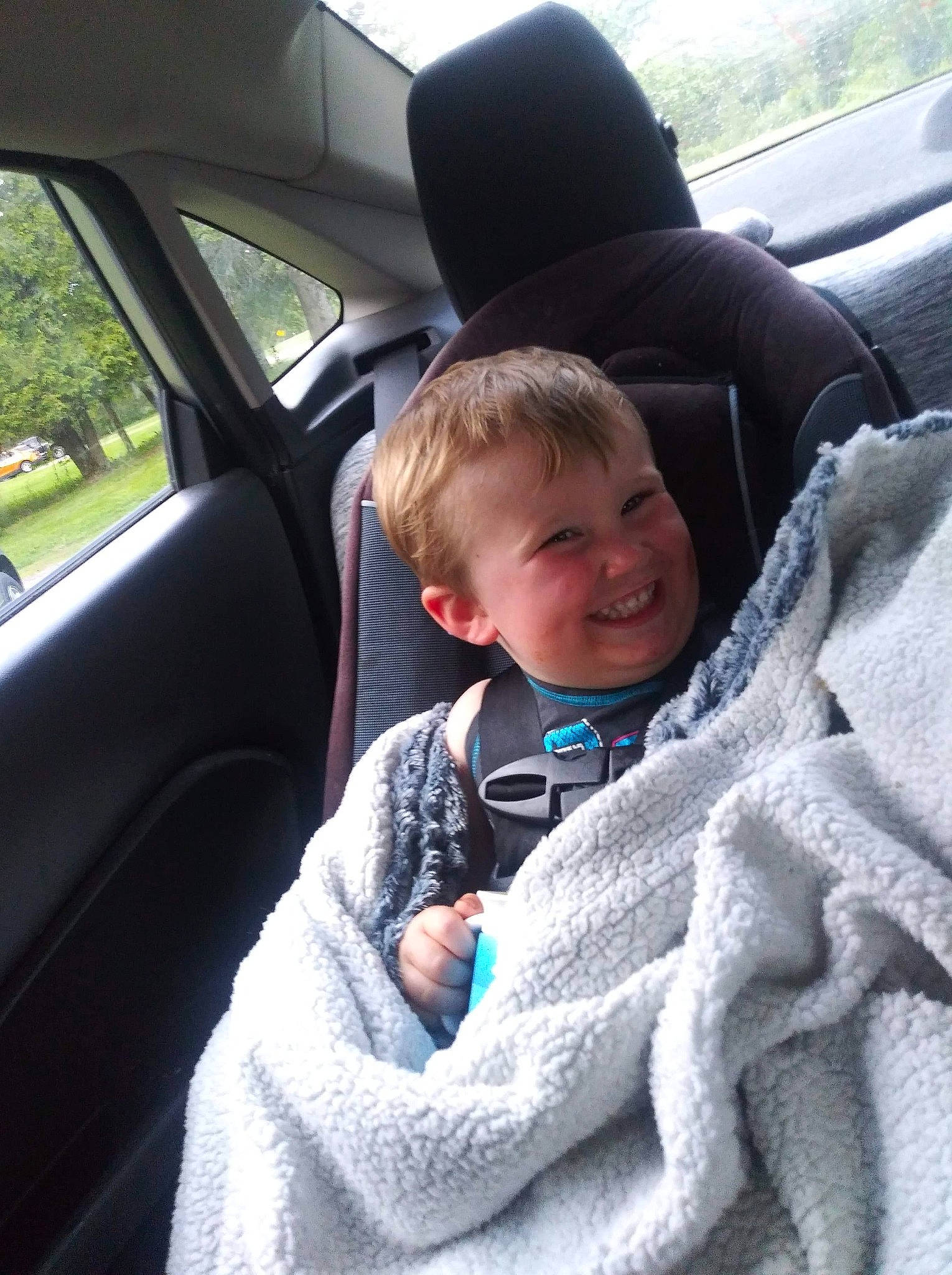 Louis is registered to the contest to win money with this photo: auto_part, baby, baby_in_car_seat, car, car_seat, car_seat_cover, child, driving, family_car, joy, person, seat_belt, toddler, vacation, vehicle, vehicle_door