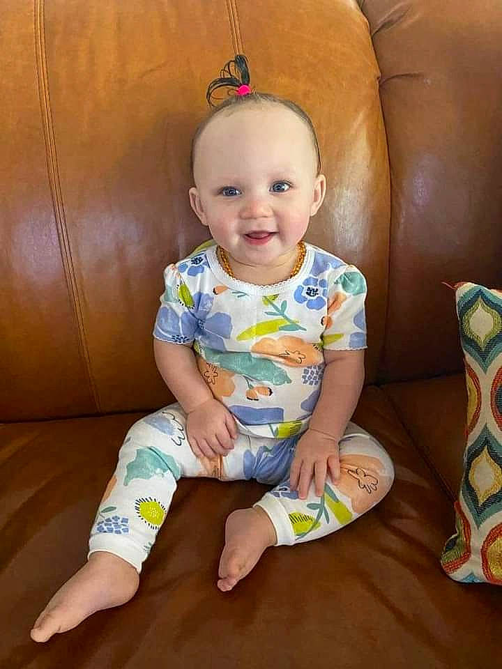 Zariah joined the competition — help win amazing prizes! baby, baby_toddler_clothing, child, comfort, finger, flooring, foot, fun, happy, human_body, human_leg, person, product, sitting, skin, sleeve, smile, t_shirt, thigh, toddler