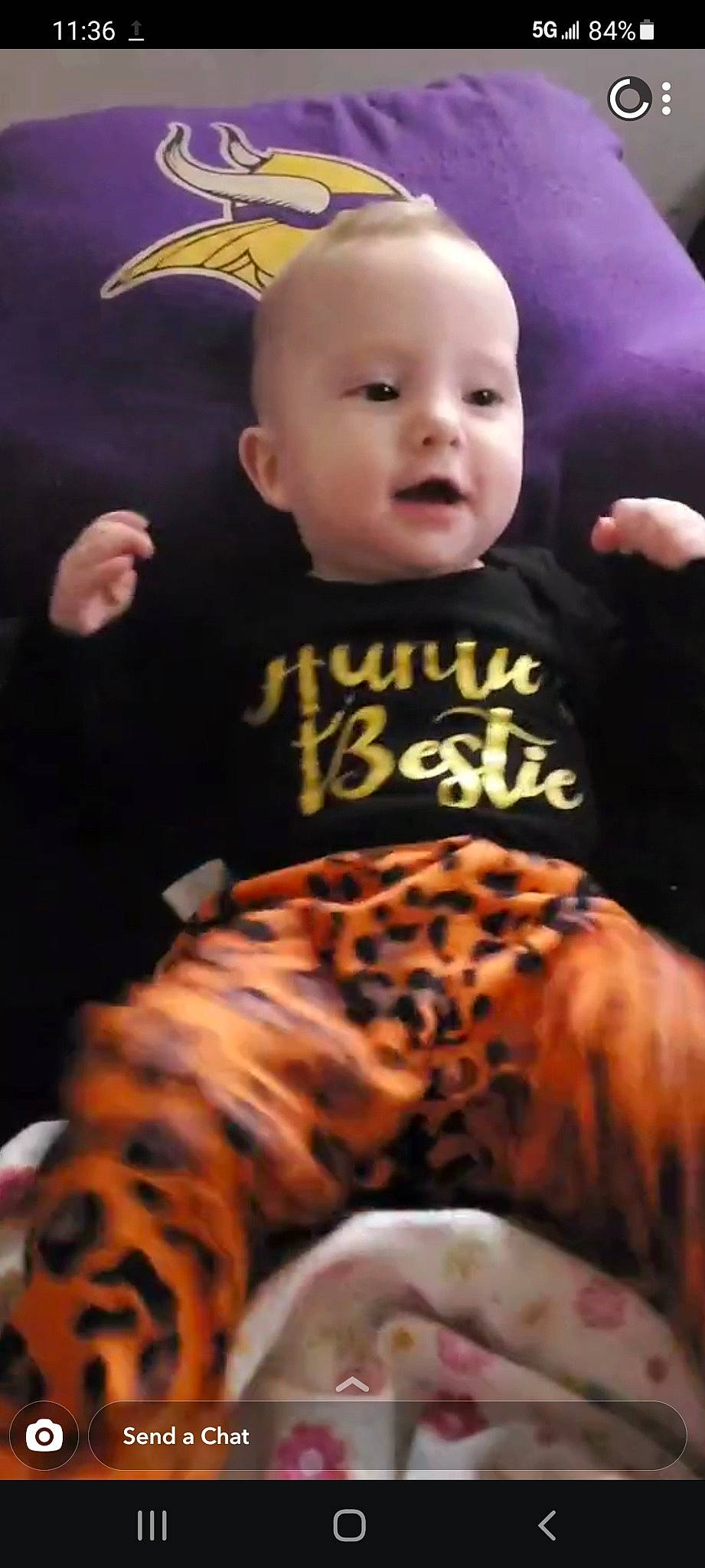 Isabelle is registered to the contest to win money with this photo: arm, baby, bengal_tiger, cheek, chin, ear, eye, face, facial_expression, hand, head, human_body, mammal, mouth, organ, person, photograph, siberian_tiger, skin, sleeve