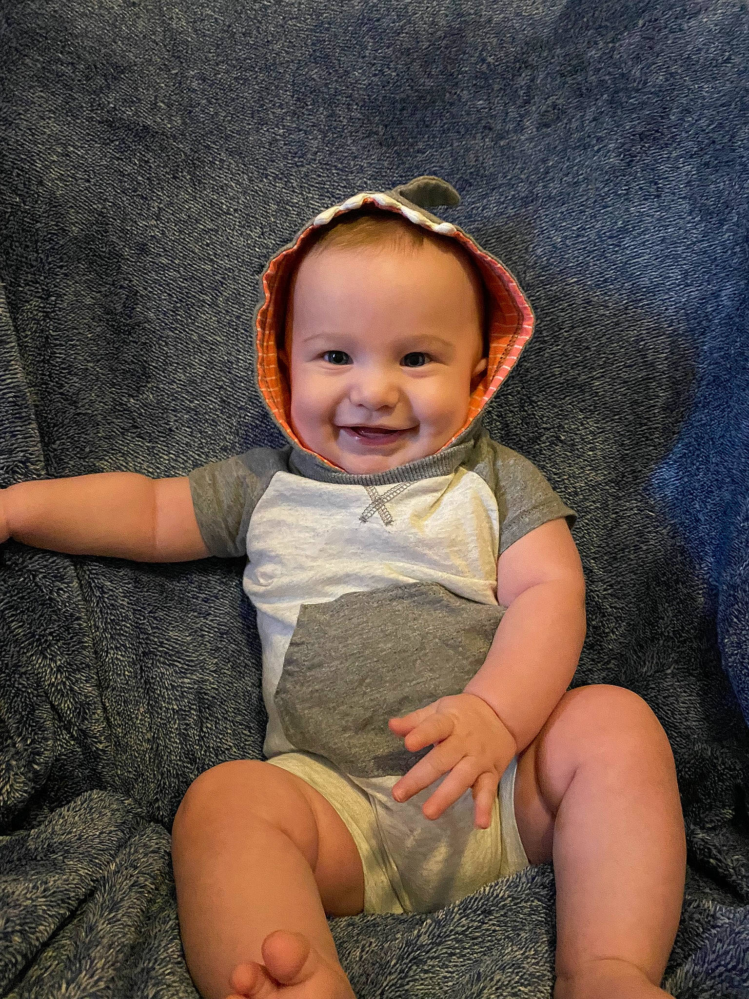 Cooper is registered to the contest to win money with this photo: baby, baby_toddler_clothing, cheek, child, comfort, eye, finger, flash_photography, fun, grass, happy, human_leg, iris, joy, leg, person, skin, sleeve, smile, thigh