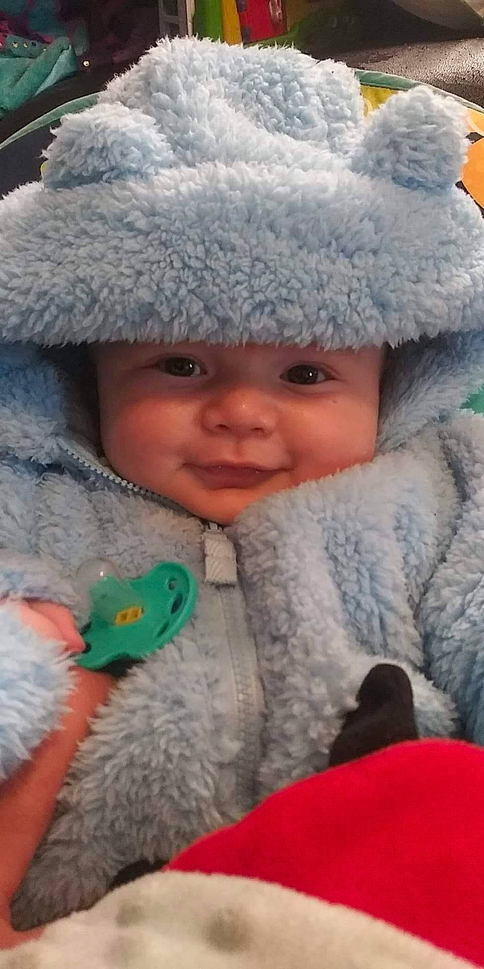 Brent'Lee is registered to the contest to win money with this photo: baby, bonnet, cap, cheek, child, fur, fur_clothing, hat, head, headgear, knit_cap, nose, person, skin, smile, toddler, winter, wool