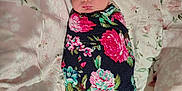 Meredith is registered to the contest to win money with this photo: newborn, baby, sleeping, wrapped, blanket, headband, floral, pattern, soft, bedspread, pastel, cute, infant, portrait, peaceful, child, indoors, resting, cozy, person