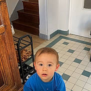 Sacha participe au concours pour gagner de l'argent avec cette photo : architecture, baby, building, clothing, face, furniture, hardwood, head, house, housing, indoors, interiordesign, livingroom, pants, person, photography, portrait, room, staircase, wood