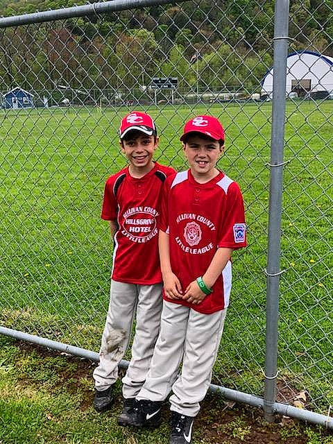 Gaige is registered to the contest to win money with this photo: ball_game, baseball, baseball_equipment, baseball_field, baseball_park, baseball_player, baseball_uniform, bat_and_ball_games, chain_link_fencing, college_baseball, grass, headwear, intramural_softball, joy, person, player, sport_venue, sports, spring, team