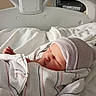 Serenity joined the competition — help win amazing prizes! newborn, baby, hospital, bed, blanket, cap, sleeping, infant, medical_equipment, white, soft, wrapped, portrait, peaceful, child, person, healthcare, cute, resting, indoors