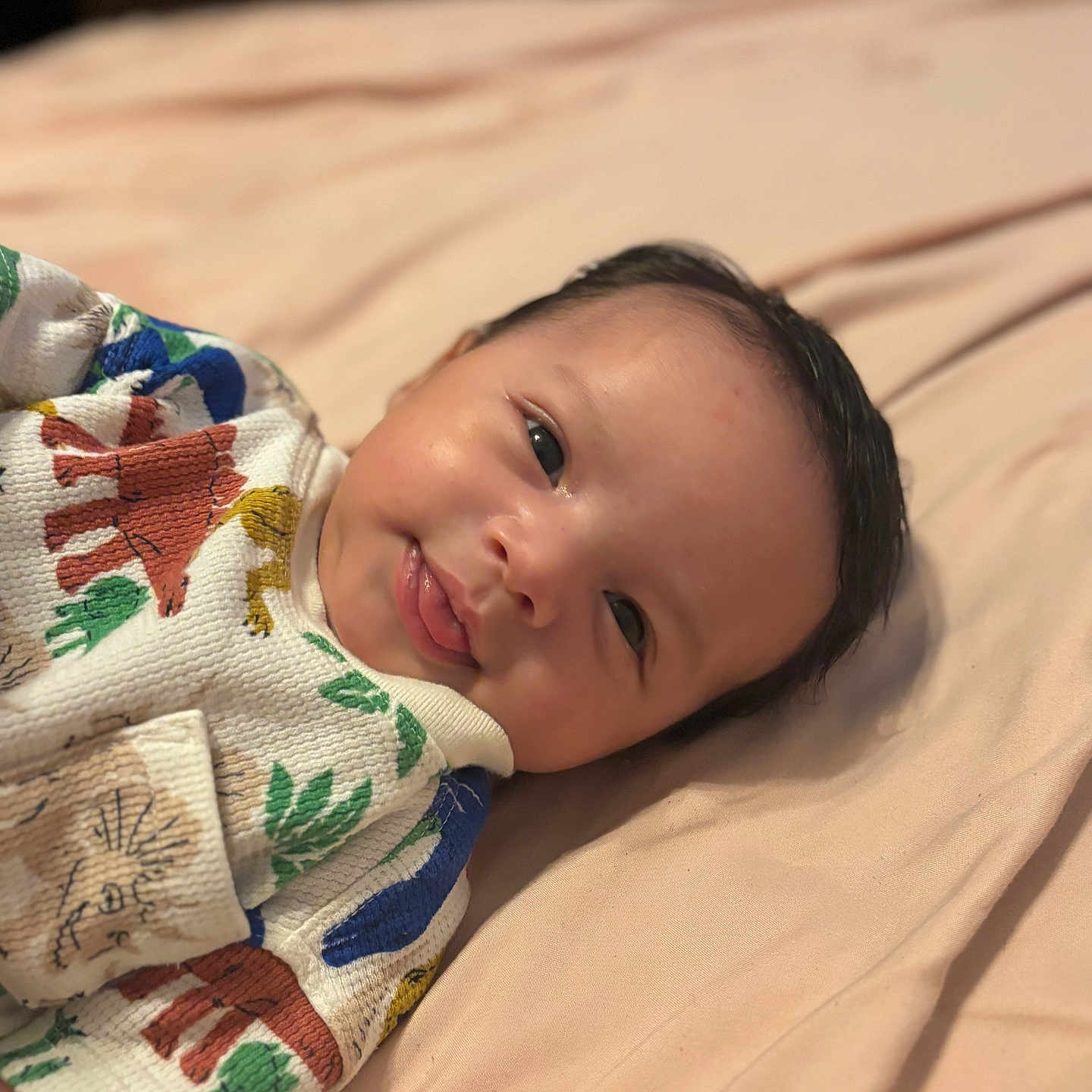 Makari joined the competition — help win amazing prizes! animal_print, baby, blanket, child, clothing, cozy, cute, expression, eyes, face, hair, indoors, infant, lying_down, pattern, portrait, skin, smile, soft, young