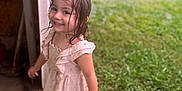 Auriella joined the competition — help win amazing prizes! child, girl, wet_hair, dress, barefoot, smiling, outdoor, grass, doorway, happy, young, person, nature, playful, summer, daylight, portrait, motion, cute, casual