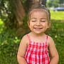 child, girl, smiling, red_dress, pink_dress, outdoor, tree, greenery, nature, happy, portrait, summer, cute, innocent, young, person, sunlight, garden, grass, casual_clothing
