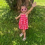 child, girl, sunglasses, pink, red_dress, checkered_pattern, tree, grass, greenery, outdoor, sunny, summer, playful, happy, smiling, sandals, nature, posing, young, casual