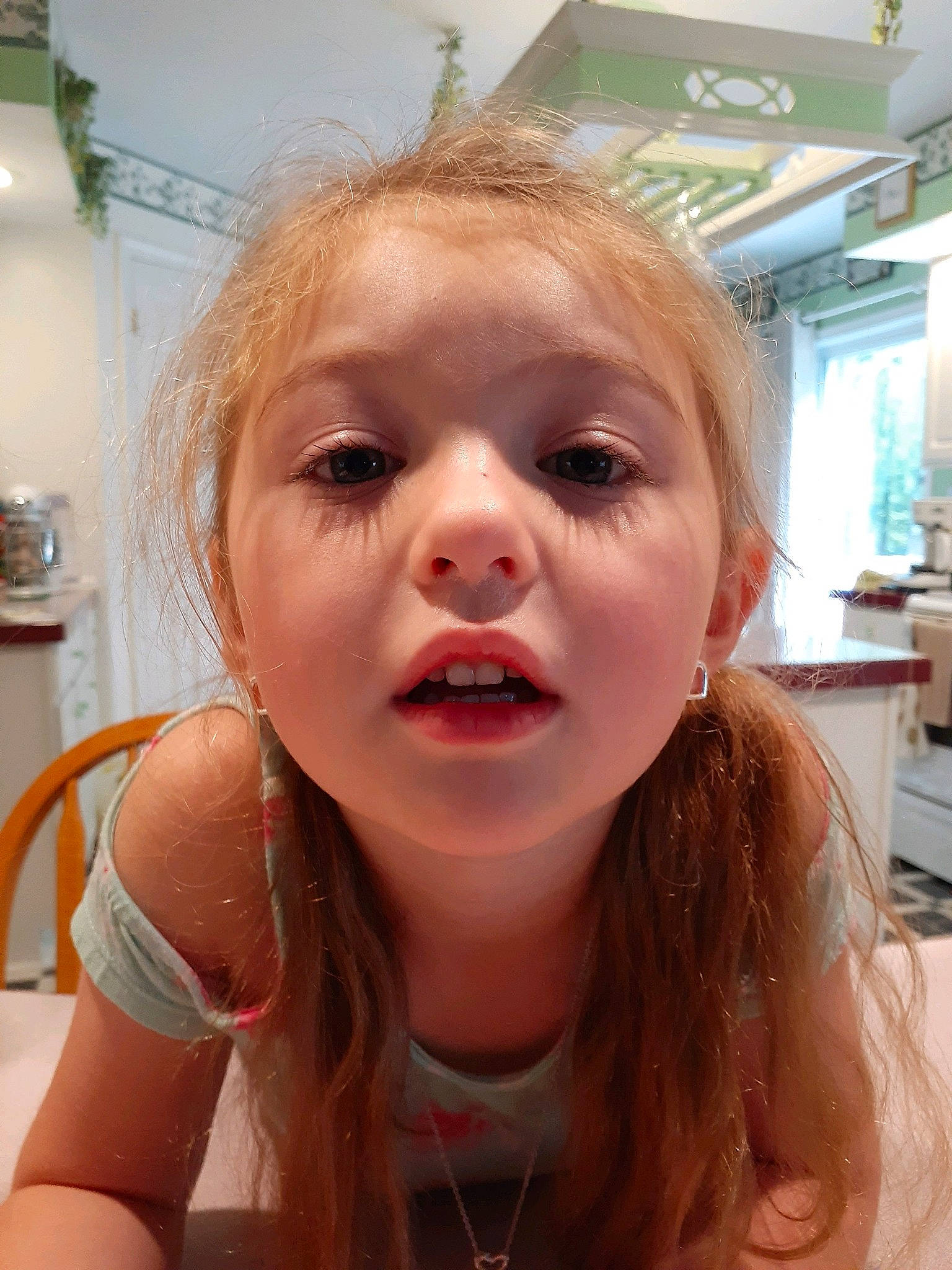 Hailee is registered to the contest to win money with this photo: bathing, blond, cheek, close_up, ear, eyebrow, eyelash, forehead, fun, happy, iris, jaw, lip, long_hair, mouth, nose, person, selfie, skin, throat