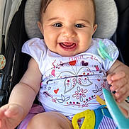 Almà participe au concours pour gagner de l'argent avec cette photo : baby, smiling, stroller, toy, infant, cute, happy, child, clothing, pattern, pacifier, hand, face, portrait, person, bright, skin, seat, playful, closeup