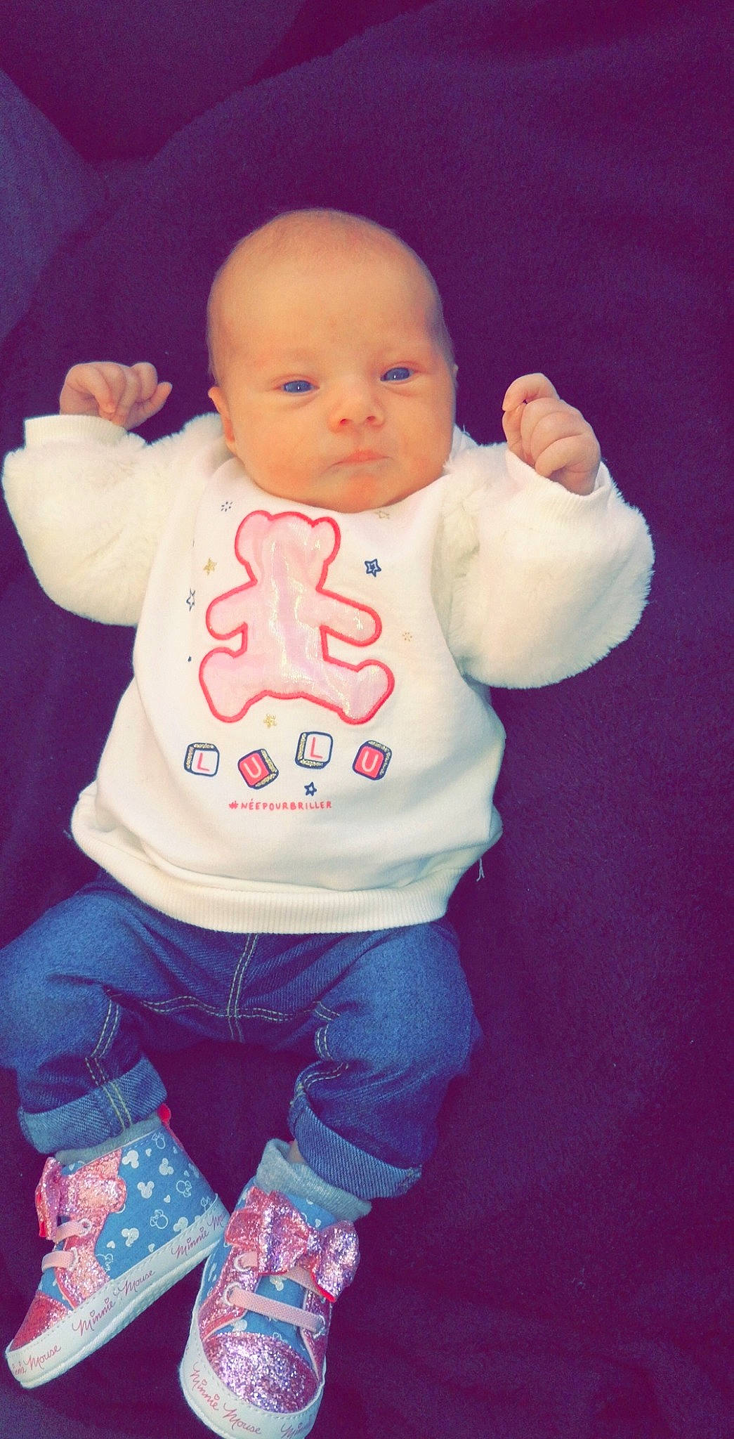 Ylanna participe au concours pour gagner de l'argent avec cette photo : baby, baby_products, baby_toddler_clothing, cheek, child, cool, finger, gesture, head, hoodie, outerwear, person, pink, product, sleeve, smile, standing, t_shirt, thumb, toddler