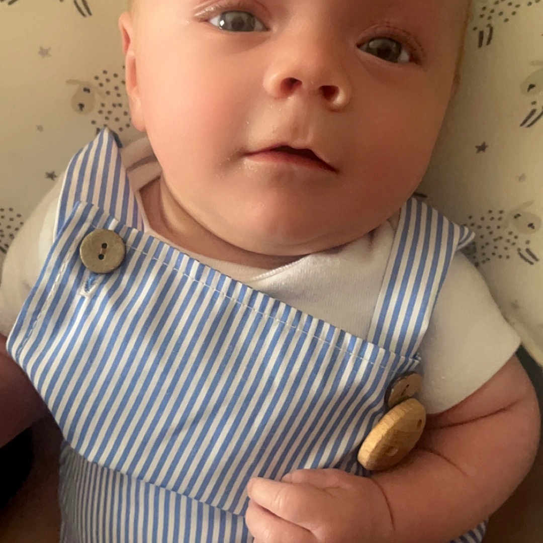 Raylan is registered to the contest to win money with this photo: baby, bodypart, couch, cutlery, face, finger, food, furniture, grain, hand, head, newborn, nut, person, photography, plant, portrait, produce, spoon, vegetable