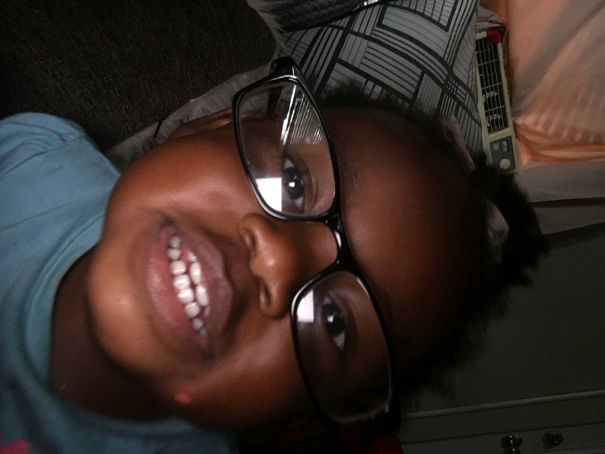 Jasiah is registered to the contest to win money with this photo: cheek, chin, ear, eyebrow, eyelash, eyewear, finger, flash_photography, gesture, glasses, happy, human_body, jaw, lip, mouth, neck, nose, person, skin, smile