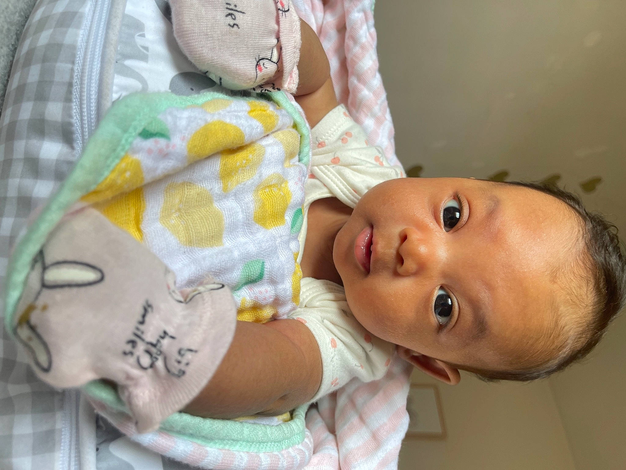 Kensley is registered to the contest to win money with this photo: baby, baby_products, baby_toddler_clothing, cheek, child, comfort, eyelash, facial_expression, happy, head, lip, mouth, nose, person, room, skin, sleeve, smile, textile, toddler