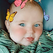 Jean-Pierre a rejoint le concours — aidez-le/la à gagner de superbes lots ! baby, blue_eyes, butterflies, car_seat, cheeks, child, closeup, cute, digital_effects, face, filter, green_clothing, happy, infant, portrait, seat, skin, smile, soft_light, sparkles