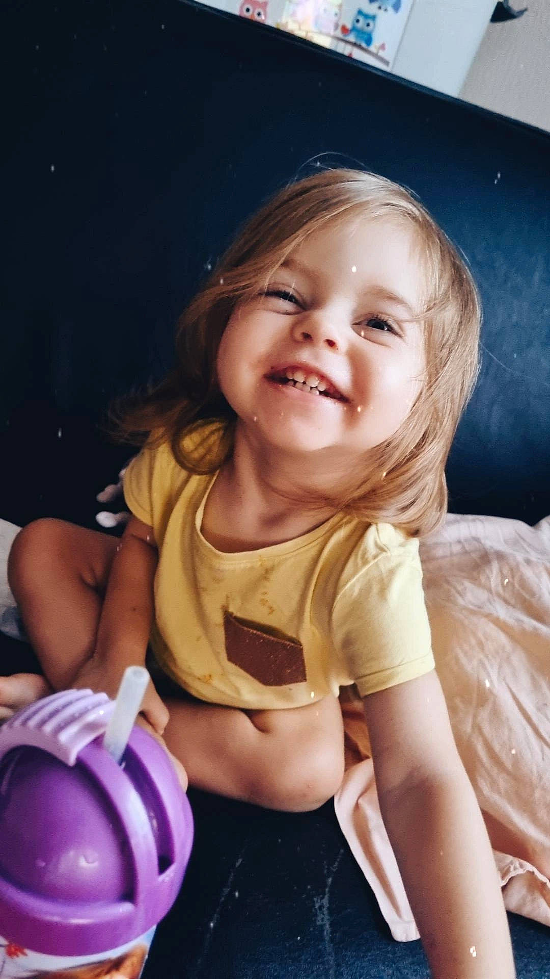 Lyanna participe au concours pour gagner de l'argent avec cette photo : arm, baby_toddler_clothing, blond, cheek, child, eye, facial_expression, finger, flash_photography, fun, happy, iris, joy, lip, mouth, person, pink, purple, skin, sleeve