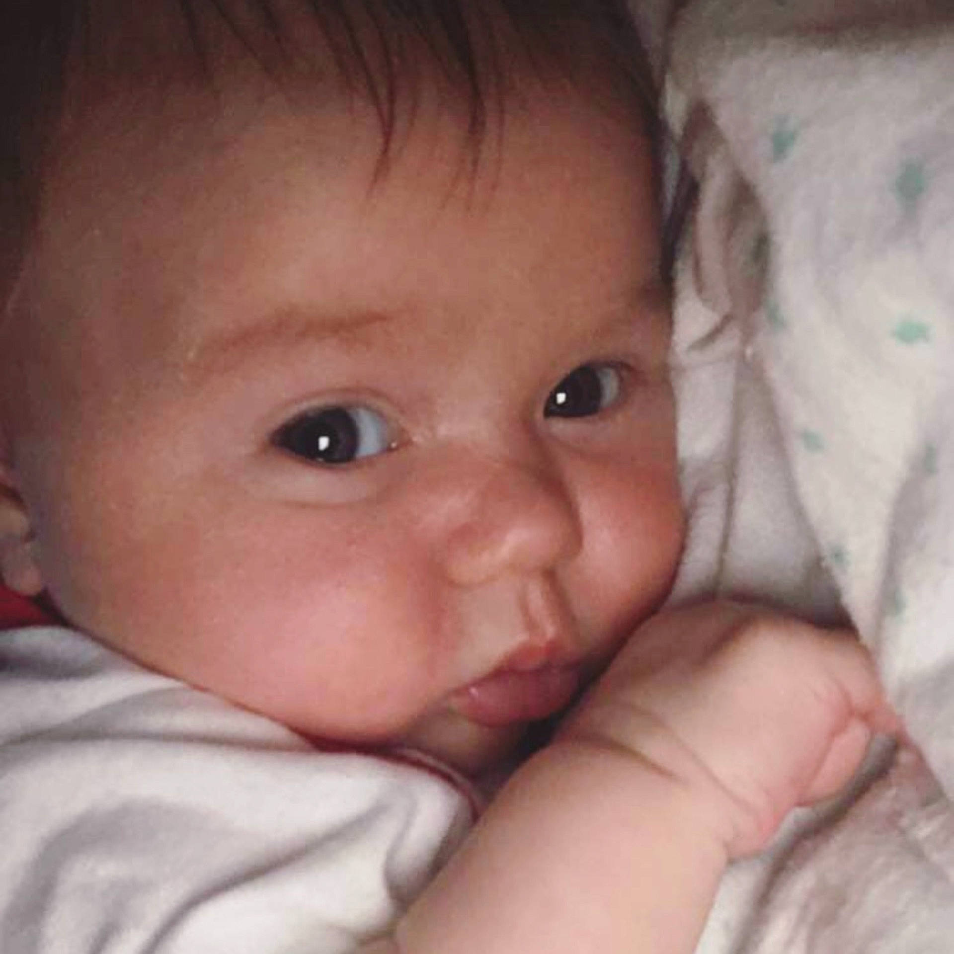 Deacon is registered to the contest to win money with this photo: cheek, child, chin, close_up, ear, eye, eyebrow, face, finger, forehead, hand, head, infant, iris, lip, mouth, nose, skin, smile, toddler