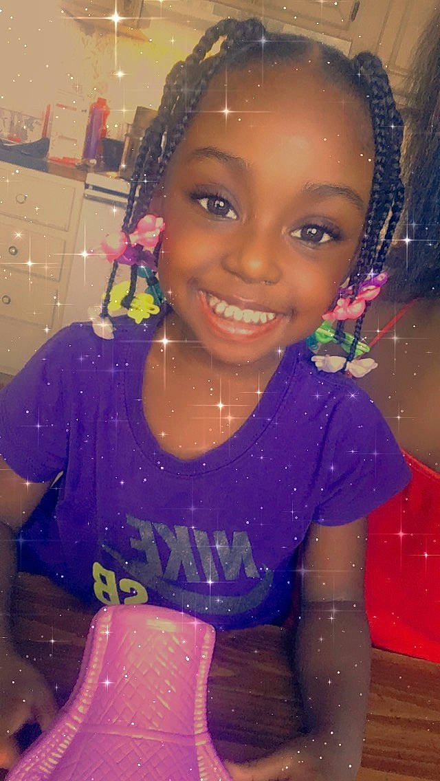 Karsyn is registered to the contest to win money with this photo: braid, cheek, child, cornrows, eyebrow, face, facial_expression, forehead, fun, hair, happy, head, joy, lip, long_hair, nose, person, play, smile, toddler