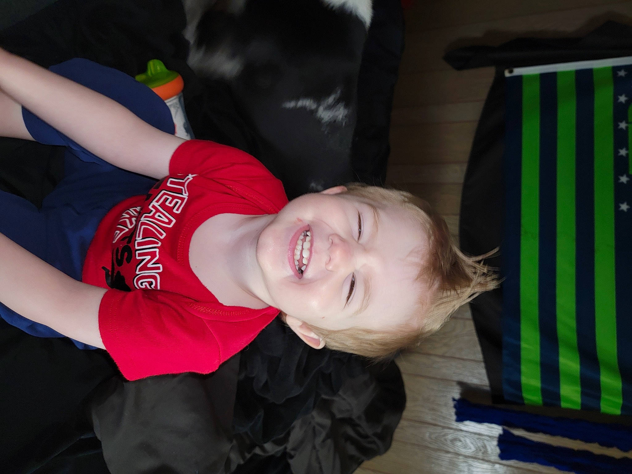 Ezekiel is registered to the contest to win money with this photo: baby_products, baby_toddler_clothing, carmine, chest, child, elbow, flash_photography, fun, happy, human_leg, joy, leisure, person, portrait_photography, sleeve, smile, sportswear, t_shirt, thigh, toddler