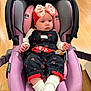 Alessia joined the competition — help win amazing prizes! baby, bow, car_seat, child, clothing, cute, floral_outfit, headband, headwear, indoors, infant, person, portrait, purple_car_seat, red_accents, seat, sitting, white_socks, wooden_floor, young_child
