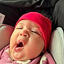 Alessia is registered to the contest to win money with this photo: baby, blanket, child, closeup, cozy, cute, face, hat, headwear, indoors, infant, person, pink_blanket, red_hat, seat, sleepy, soft_texture, toddler, warm_clothing, yawning