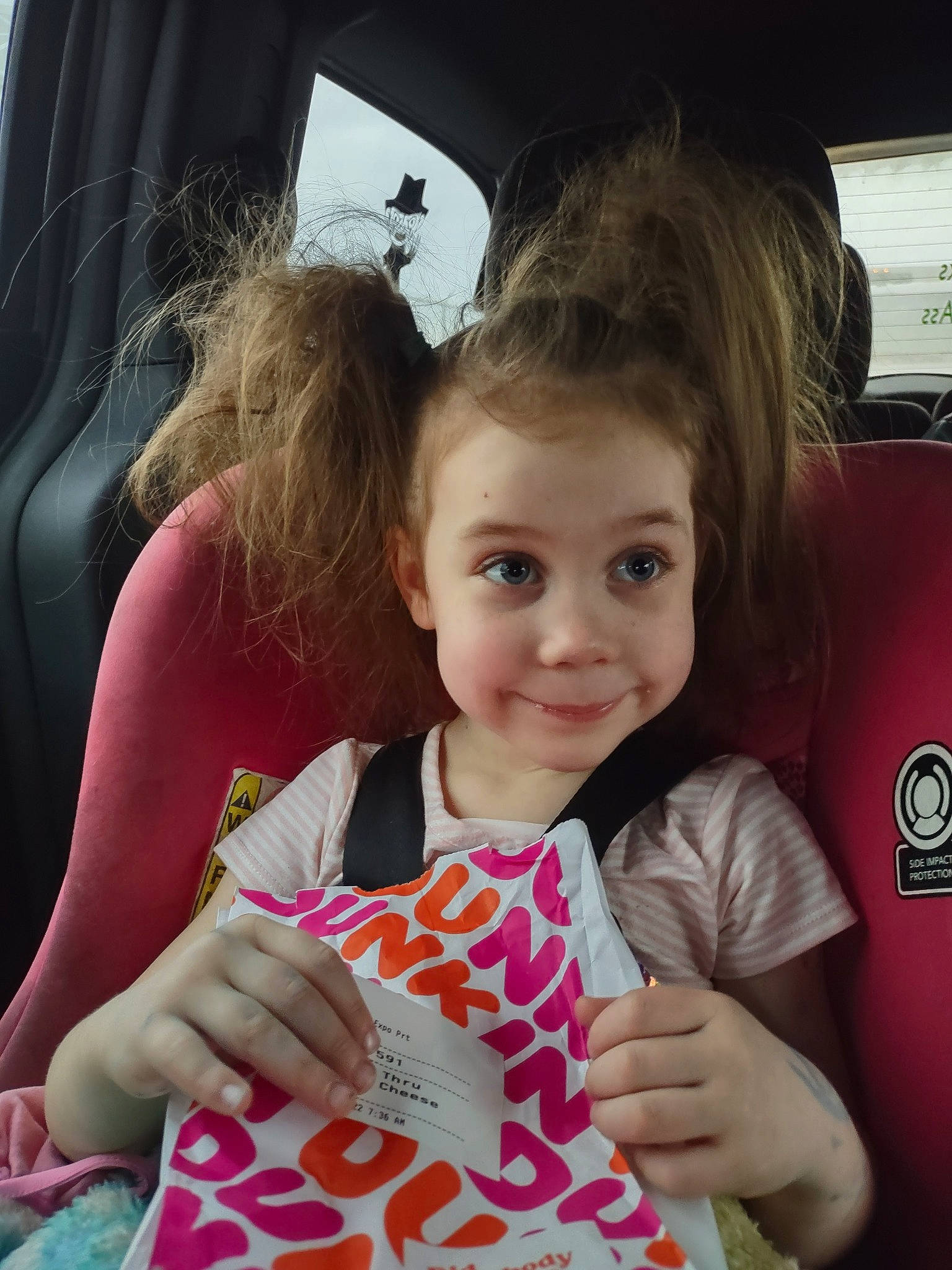 Savannah is registered to the contest to win money with this photo: baby_toddler_clothing, car_seat, car_seat_cover, child, face, finger, fun, gesture, hairstyle, hand, happy, head_restraint, joy, mammal, people, person, skin, smile, thumb, toddler