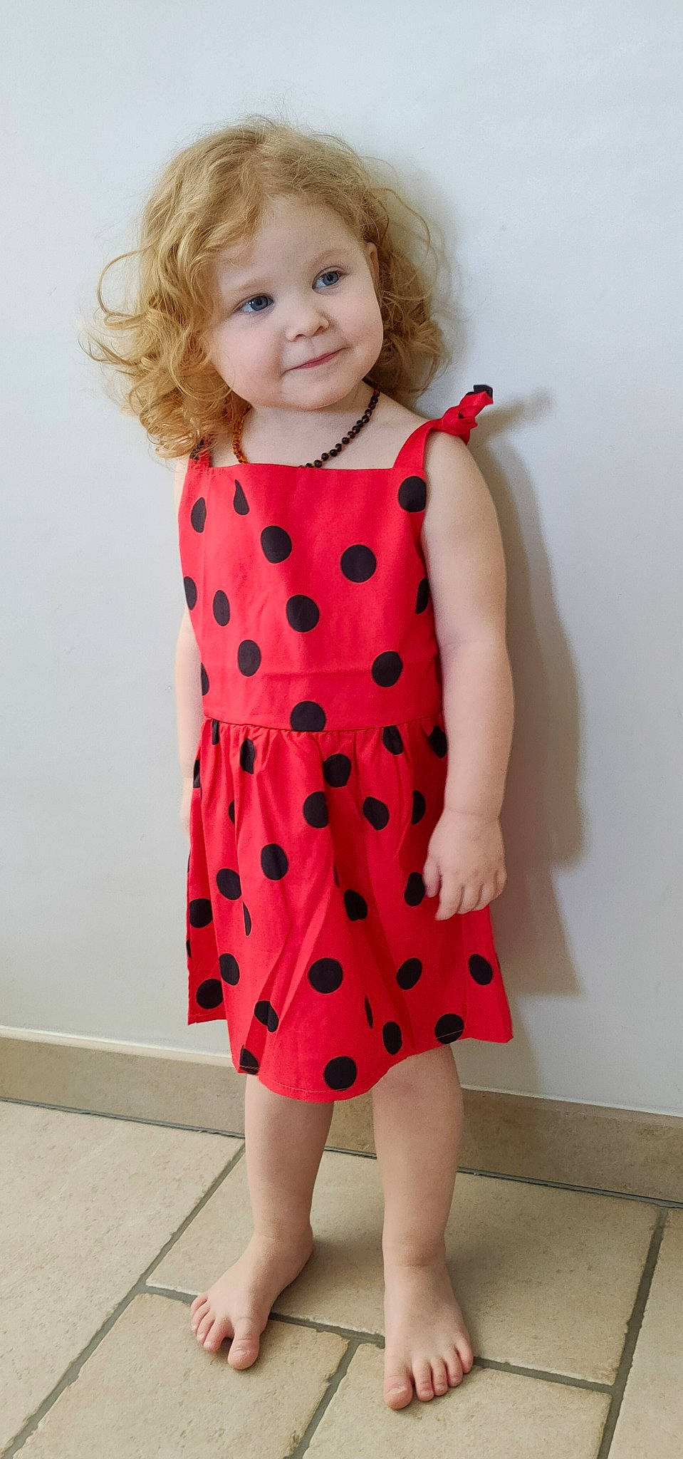 Xiomara participe au concours pour gagner de l'argent avec cette photo : arm, baby_toddler_clothing, child, clothing, day_dress, dress, hand, jeans, joy, neck, one_piece_garment, outerwear, pattern, person, pink, shoulder, sleeve, smile, standing, toddler