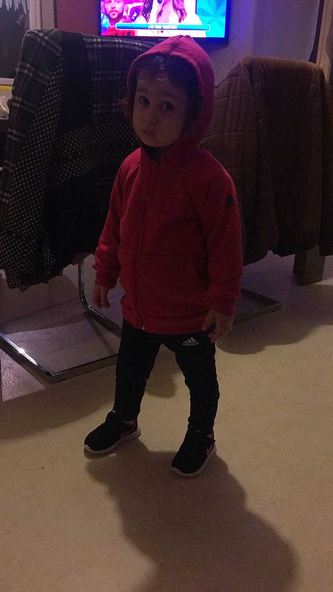 Lou participe au concours pour gagner de l'argent avec cette photo : child, clothing, cool, costume, day, floor, flooring, fun, girl, outerwear, person, pink, product, red, shoe, snapshot, standing, textile, toddler, under_exposed