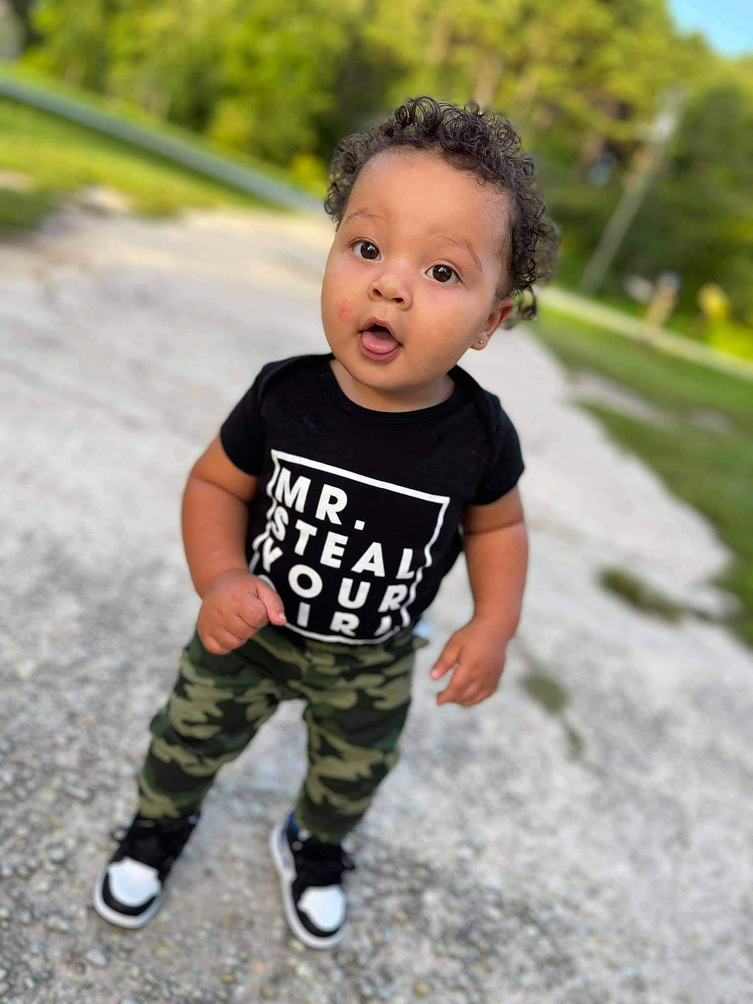 Kamari joined the competition — help win amazing prizes! baby, baby_toddler_clothing, child, flash_photography, fun, grass, happy, leisure, pattern, people_in_nature, person, plant, portrait_photography, sleeve, smile, standing, street_fashion, surprise, t_shirt, toddler