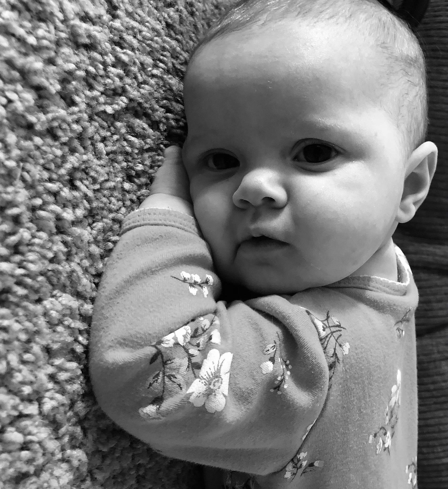 Iylah joined the competition — help win amazing prizes! baby, baby_toddler_clothing, black_and_white, cheek, chin, cool, flash_photography, gesture, grey, happy, iris, lip, monochrome, mouth, nose, person, skin, smile, standing, style