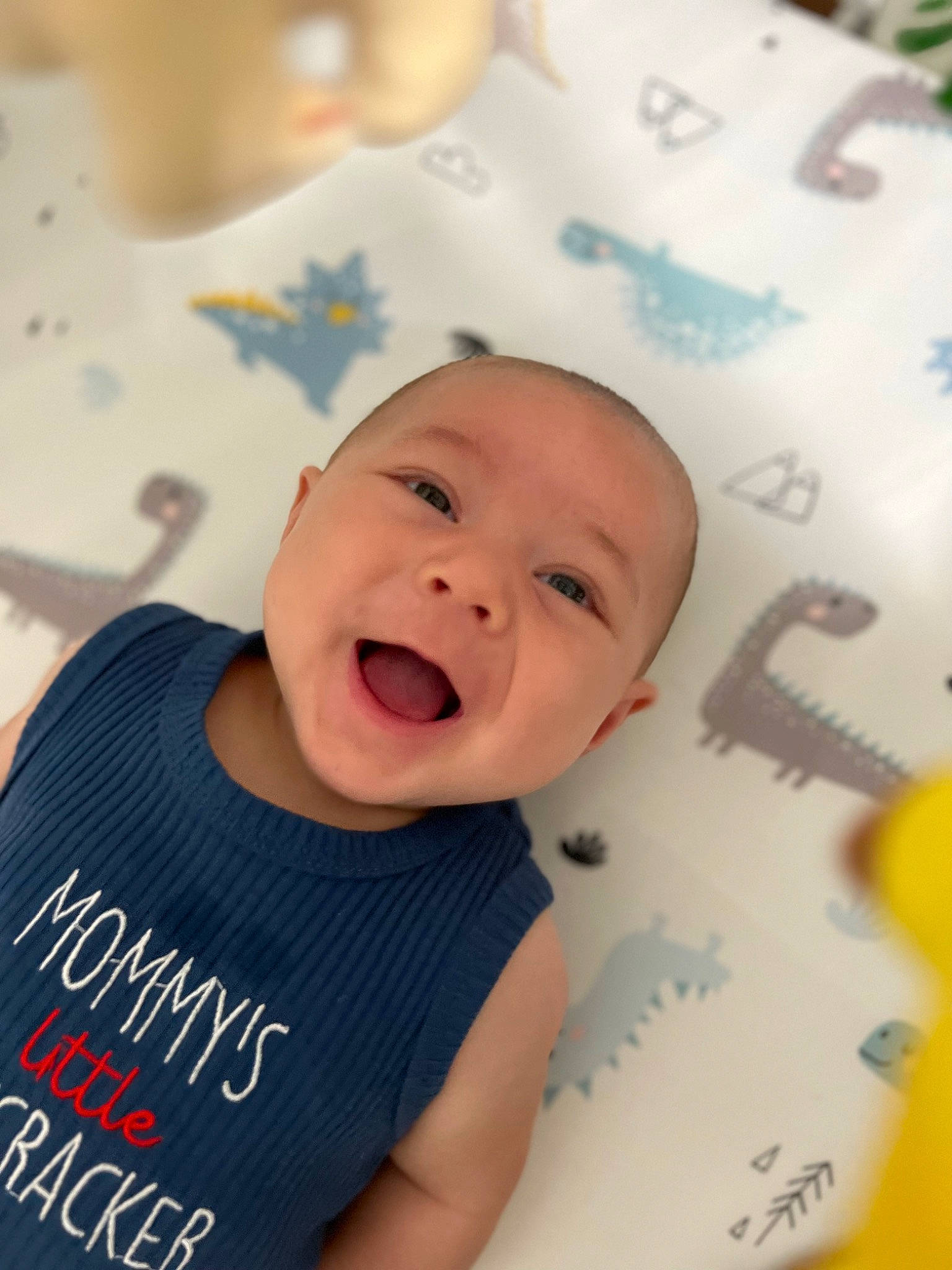 Jensen is registered to the contest to win money with this photo: baby, baby_laughing, baby_toddler_clothing, cheek, child, chin, font, fun, happy, laugh, mouth, nose, person, product, room, skin, sleeve, smile, t_shirt, toddler