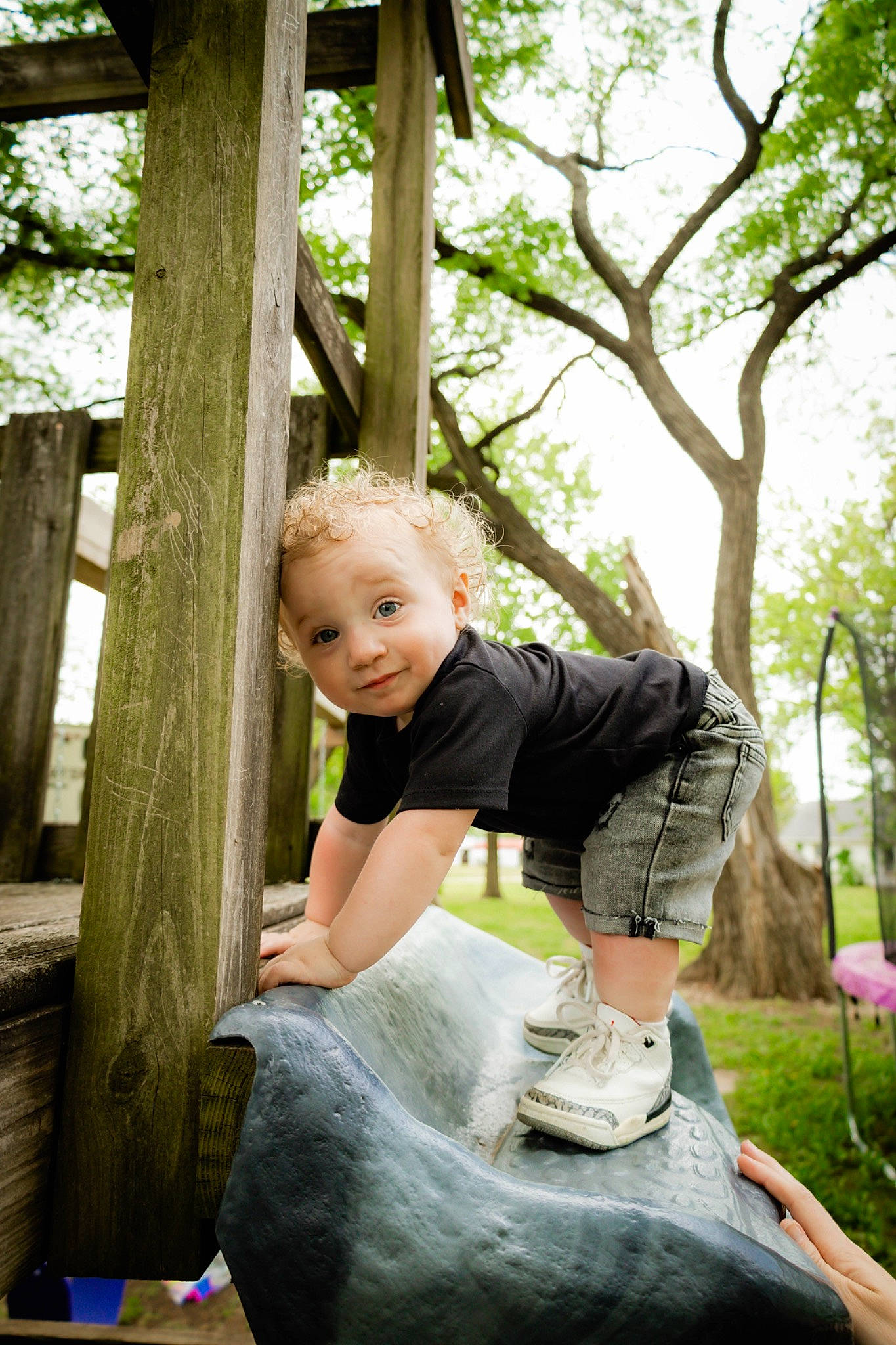 Emory is registered to the contest to win money with this photo: child, fun, grass, happy, leisure, outdoor_play_equipment, people_in_nature, person, plant, recreation, shorts, sitting, smile, soil, swing, t_shirt, toddler, tree, trunk, wood