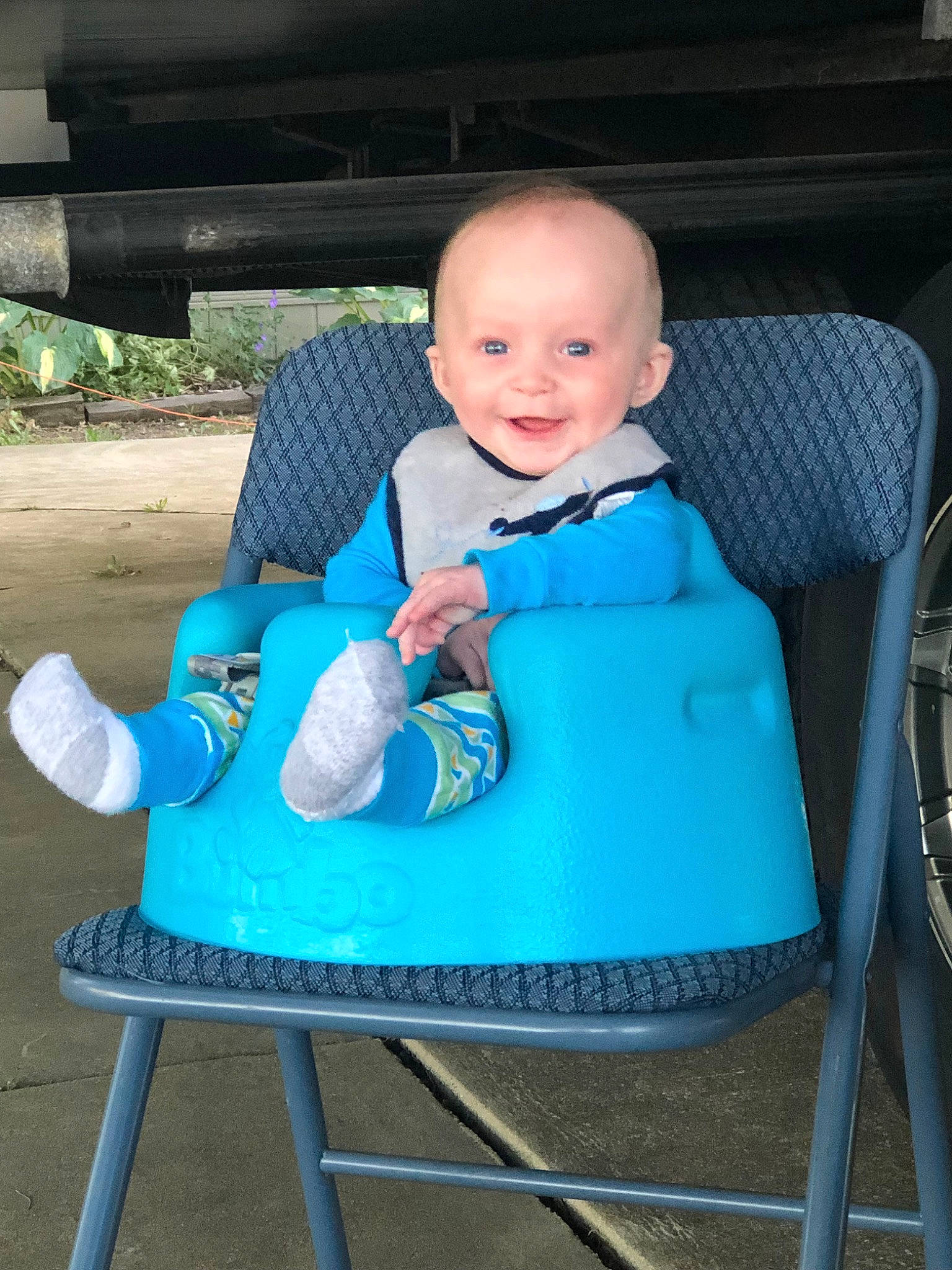 Donovyn is registered to the contest to win money with this photo: baby, baby_products, baby_toddler_clothing, blue, chair, child, furniture, joy, person, product, sitting, toddler, turquoise