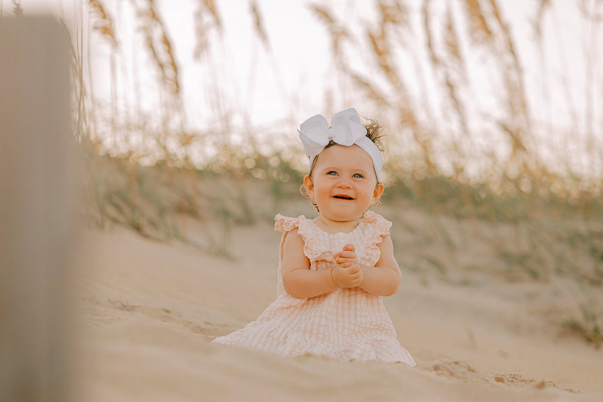 Tatum joined the competition — help win amazing prizes! baby, baby_toddler_clothing, child, dress, embellishment, eye, fashion_accessory, flash_photography, grass, hair_accessory, happy, hat, headband, headpiece, headwear, joy, people_in_nature, person, sitting, sky