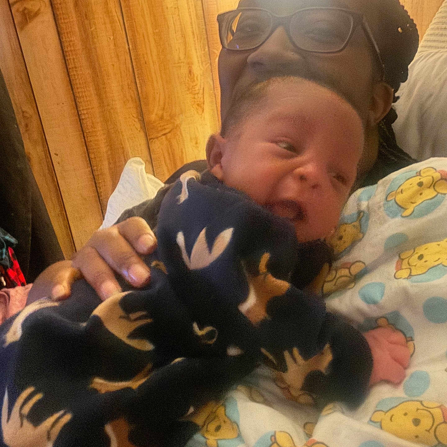Josiah joined the competition — help win amazing prizes! accessories, adult, baby, bed, bedroom, blanket, bride, face, female, furniture, glasses, head, newborn, person, photography, portrait, quilt, sleeping, wedding, woman