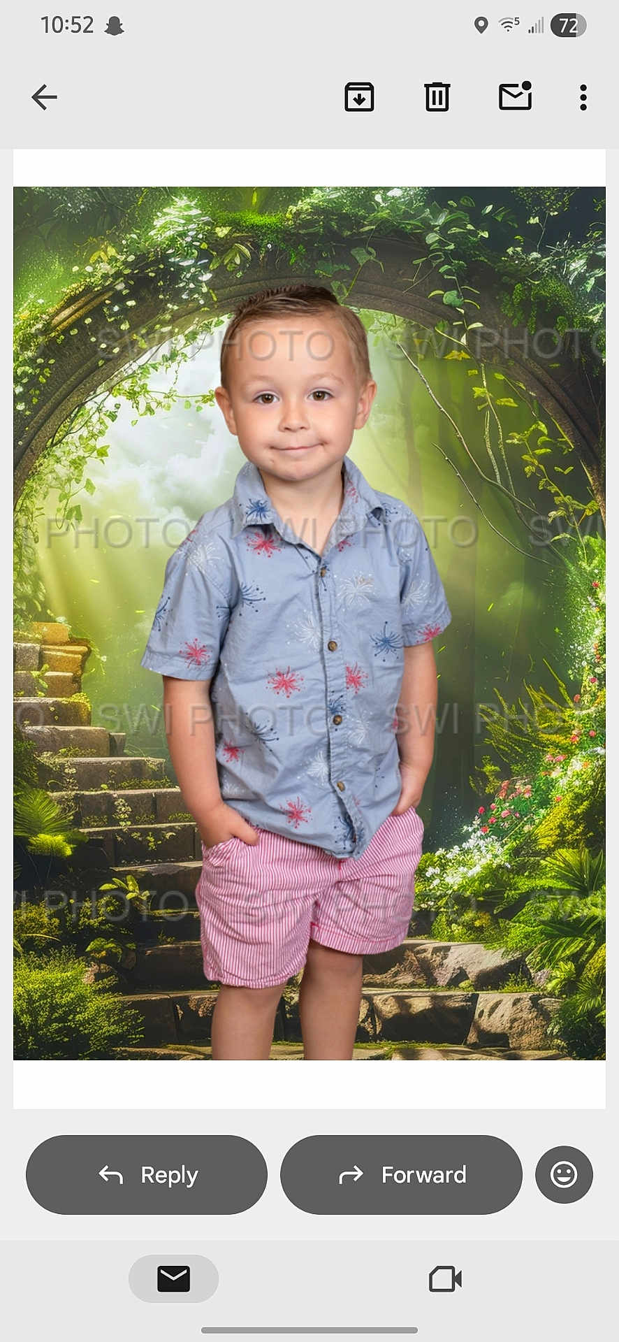 Mason is registered to the contest to win money with this photo: child, boy, portrait, standing, hands_in_pockets, smile, shirt, shorts, studio_background, fantasy_background, arch, stone_steps, greenery, plants, watermark, screenshot, phone_ui, email_app, indoor, casual_clothing