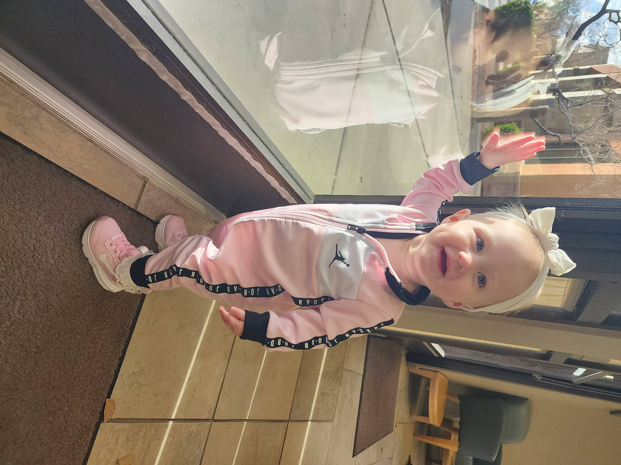 Bailey joined the competition — help win amazing prizes! automotive_exterior, automotive_window_part, baby_toddler_clothing, ceiling, child, flooring, fun, hardwood, hat, joy, person, toddler, transport, vehicle_door, windshield, wood