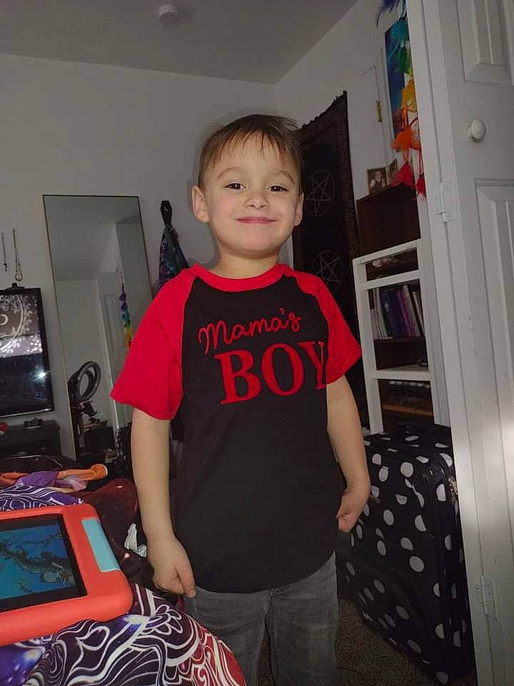 Lane joined the competition — help win amazing prizes! chair, child, computer_keyboard, display_device, door, flooring, fun, gadget, joy, machine, pattern, person, room, sleeve, smile, standing, t_shirt, thigh, toddler, top