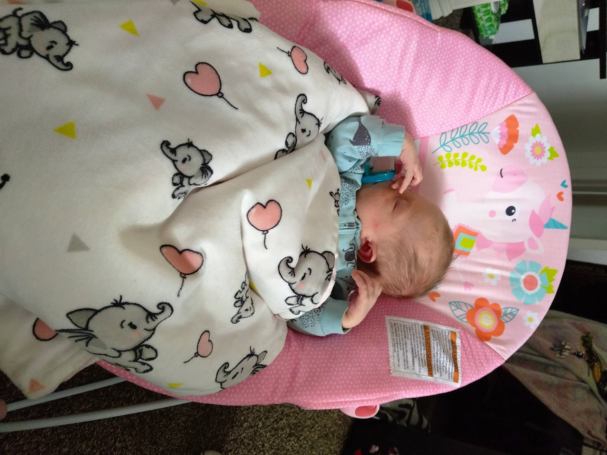 Lucy is registered to the contest to win money with this photo: baby, baby_products, baby_toddler_clothing, bedding, carmine, child, comfort, headgear, linens, pattern, person, room, sitting, sleeve, sock, textile, toddler