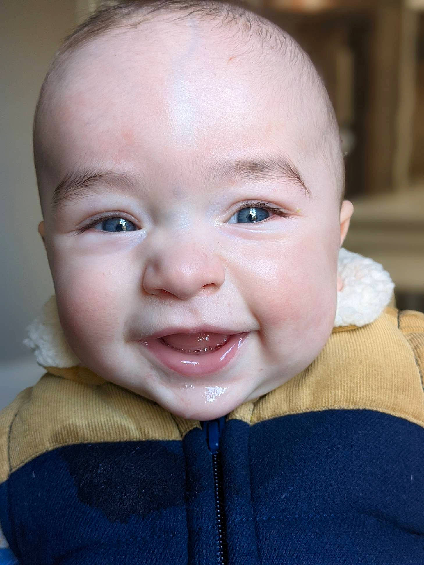 Lochlan joined the competition — help win amazing prizes! baby, baby_laughing, baby_toddler_clothing, cheek, child, clothing, ear, eyebrow, eyelash, fun, happy, lip, mouth, neck, nose, outerwear, person, skin, sleeve, smile