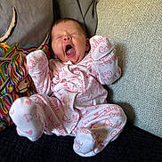 Oaklynn joined the competition — help win amazing prizes! baby, infant, pajamas, yawning, couch, cushion, colorful, clothing, indoor, child, person, sleepy, cute, cozy, home, newborn, soft, resting, furniture, relaxing