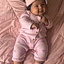 baby, babylaughing, blanket, clothing, face, happy, head, hosiery, pajamas, person, smile, sock, yawning