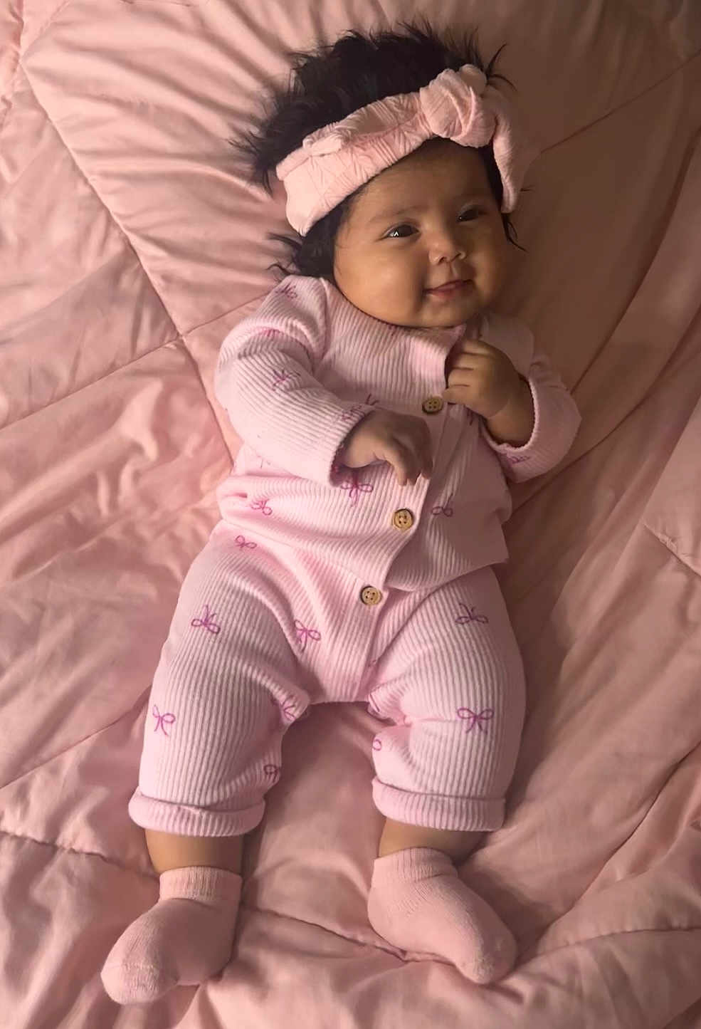 Leilani is registered to the contest to win money with this photo: baby, babylaughing, blanket, clothing, face, happy, head, hosiery, pajamas, person, smile, sock, yawning