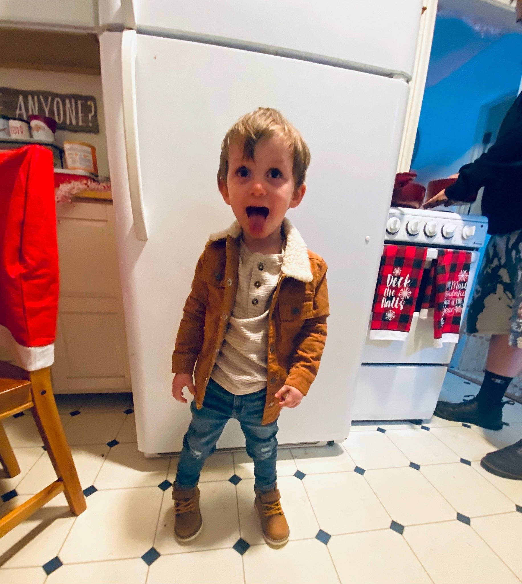Uriah Dean is registered to the contest to win money with this photo: baby_toddler_clothing, child, denim, fashion_design, floor, flooring, fun, hardwood, human_leg, joint, knee, leg, pattern, person, shelf, shoe, sleeve, street_fashion, surprise, toddler