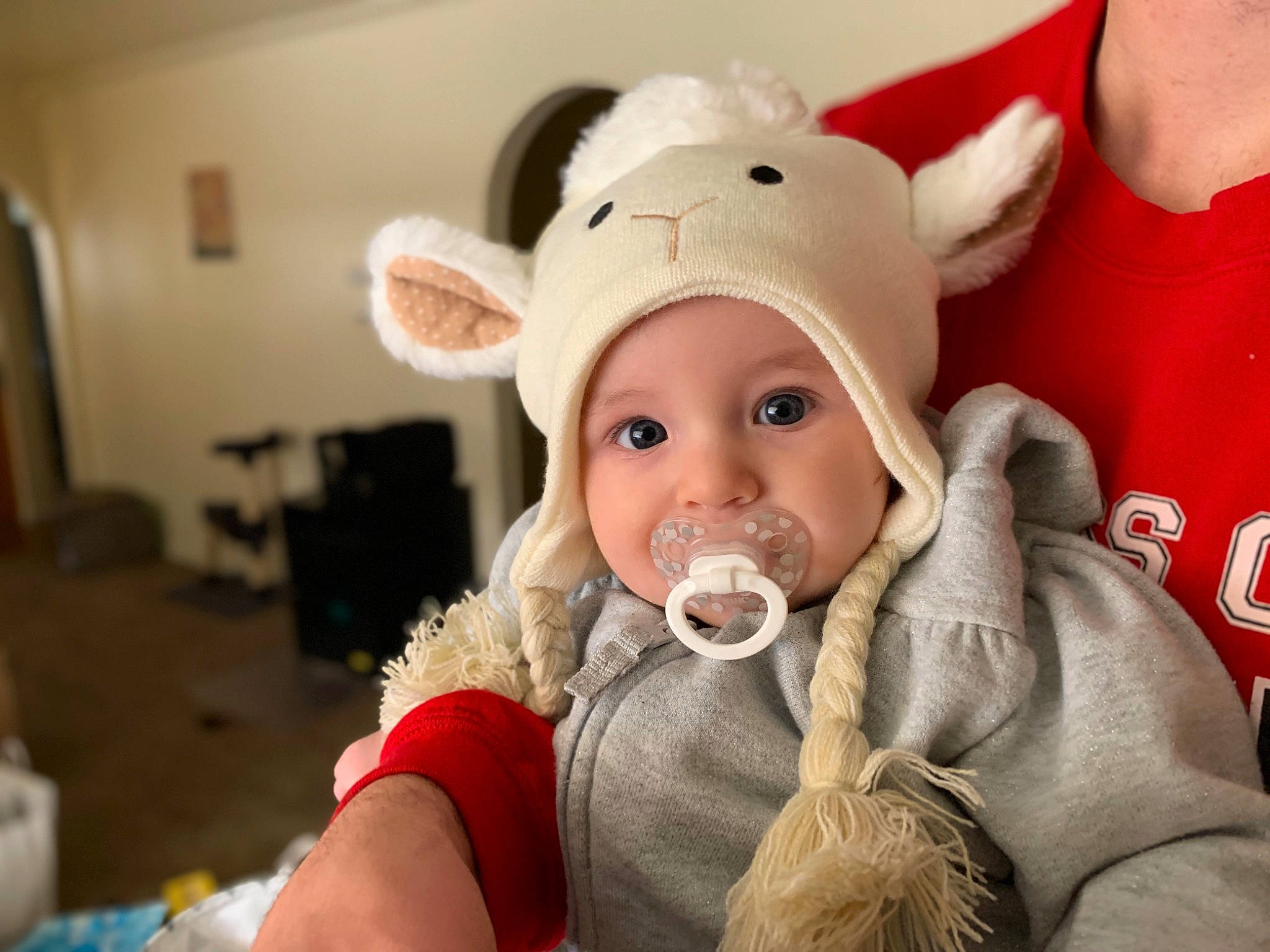 Althea is registered to the contest to win money with this photo: baby, baby_toddler_clothing, cap, cheek, child, comfort, costume_hat, ear, event, eye, eyelash, finger, fun, fur, gesture, happy, headwear, lip, person, picture_frame