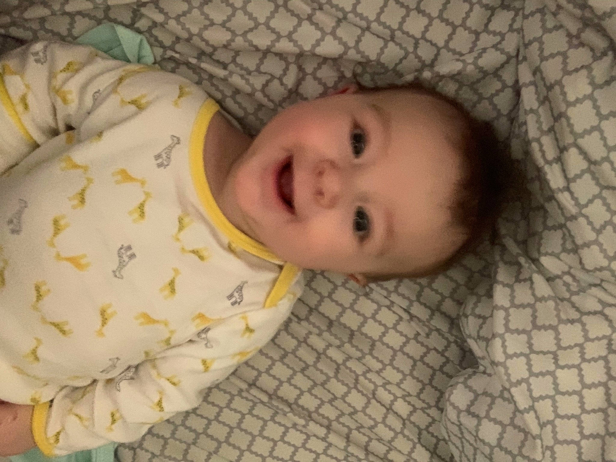 Althea is registered to the contest to win money with this photo: baby, baby_toddler_clothing, cheek, child, chin, comfort, facial_expression, flooring, head, iris, joy, linens, lip, nose, pattern, person, product, skin, sleeve, smile