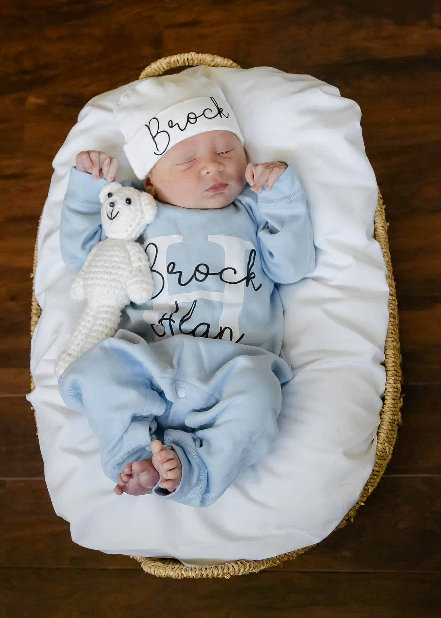 Brock is registered to the contest to win money with this photo: baby, baby_products, baby_sleeping, baby_toddler_clothing, cap, child, comfort, electric_blue, font, fur, happy, hat, headwear, linens, pattern, person, portrait_photography, sitting, sleeve, toddler