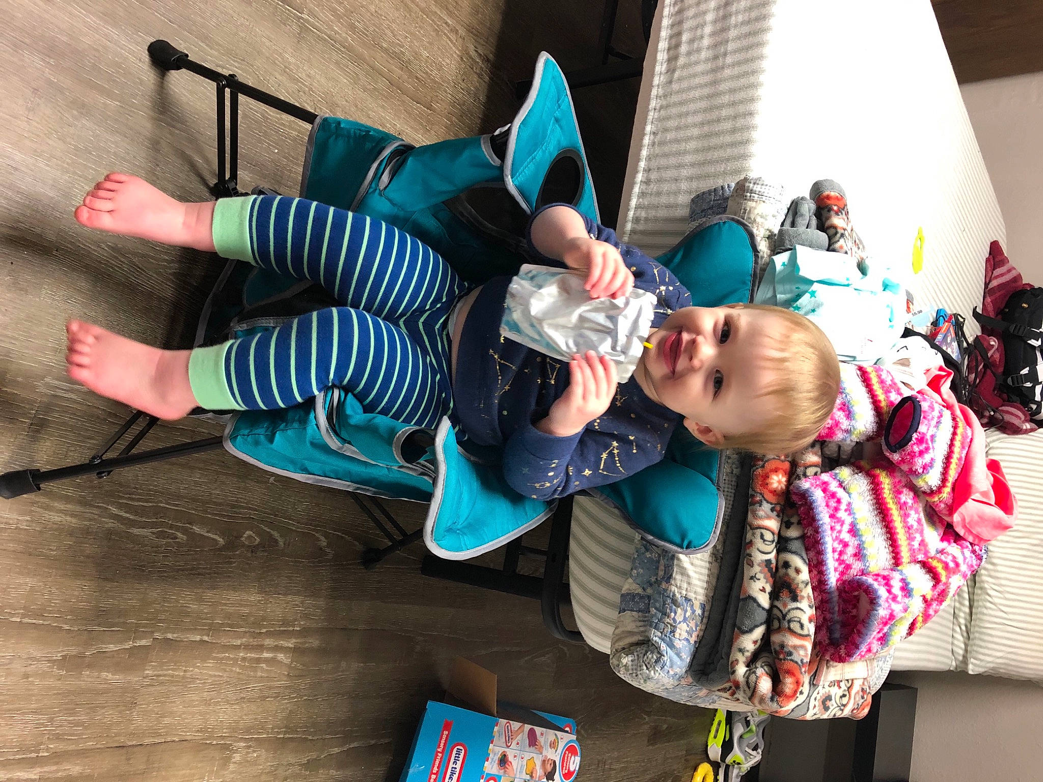 Raylynn is registered to the contest to win money with this photo: baby, baby_products, baby_toddler_clothing, blue, child, event, foot, fun, happy, interaction, jacket, joy, leisure, person, pink, play, sitting, street_fashion, toddler, tree