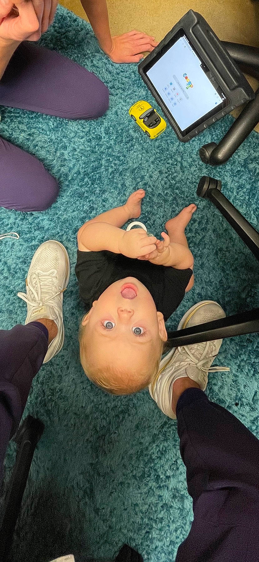 Daxton is registered to the contest to win money with this photo: balance, barefoot, chest, elbow, electric_blue, flesh, flooring, foot, fun, gesture, human_leg, joint, knee, metal, nail, person, sitting, snapshot, surprise, thigh